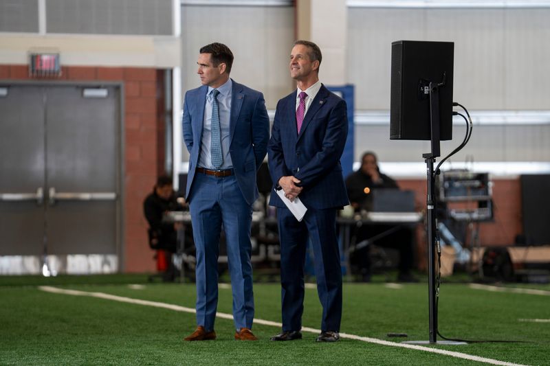 General Manager Joe Schoen, left, and new New Giants Head Coach John Harbaugh stand together during a press conference introducing new Head Coach John Harbaugh at the Quest Diagnostics Training Center in East Rutherford on Tuesday, Jan. 20, 2025.