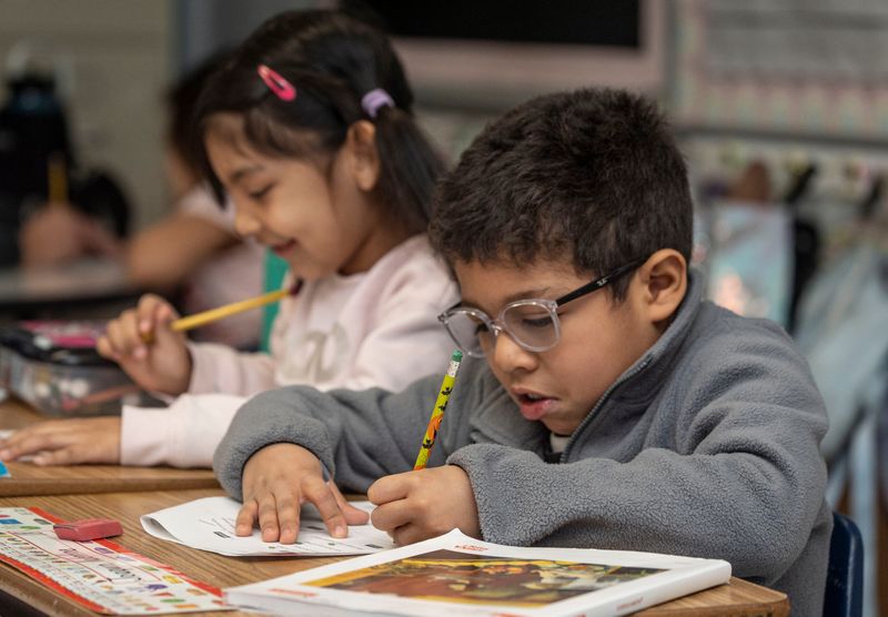 Joaquin Valentine and Demi Rodriguez, first graders at the Buchanan-Verplanck Elementary School in Buchanan, work at their desks Feb. 4, 2026. The Hendrick Hudson Central School District is facing an annual loss of $25 million due to the closure of the Indian Point Energy Center.