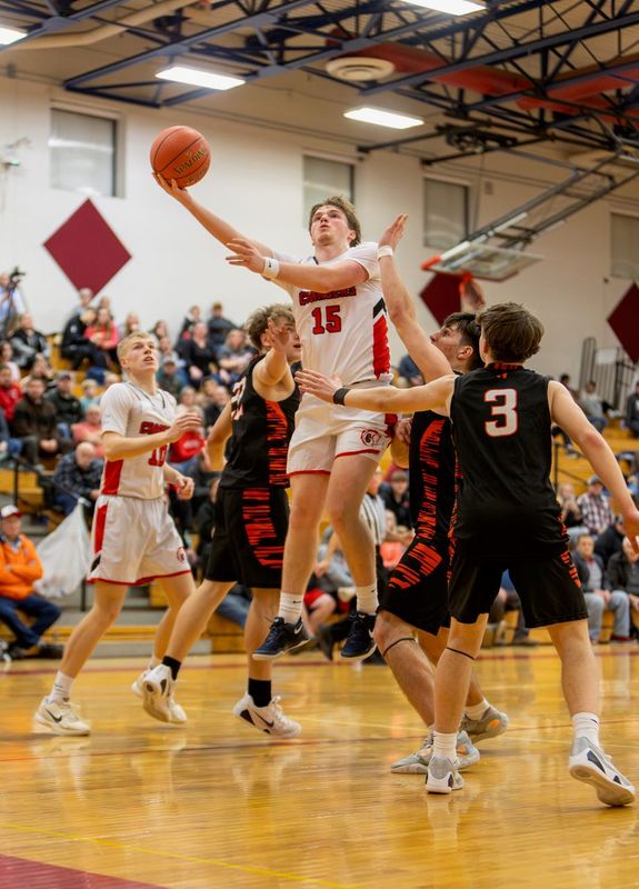 Canisteo-Greenwood senior Jaxon O'Brien (15) slices through the Wellsville defense in a 76-63 home win over the Lions Wednesday, Feb. 4, 2026.
