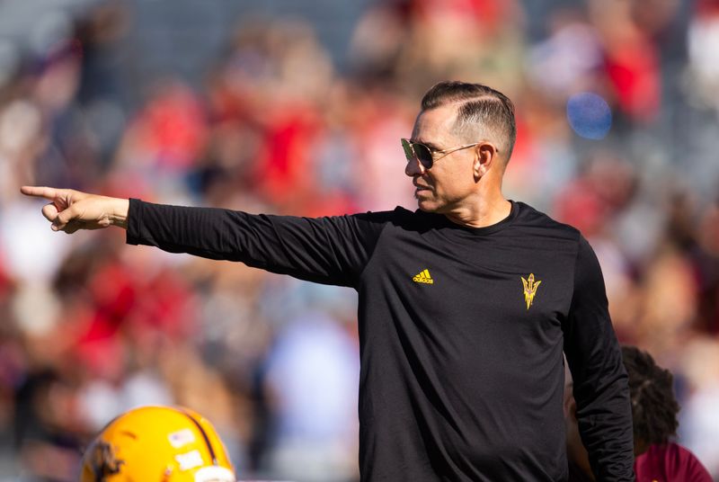 Nov 30, 2024; Tucson, Arizona, USA; Arizona State Sun Devils offensive coordinator Marcus Arroyo against the Arizona Wildcats during the Territorial Cup at Arizona Stadium. Mandatory Credit: Mark J. Rebilas-Imagn Images