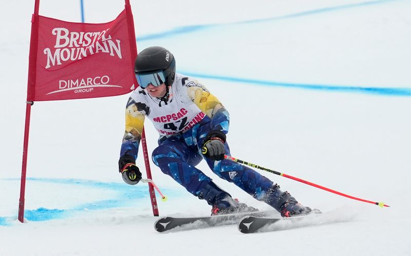 Brody Ireland, Victor, rounds a gate during the boys giant slalom run, as part of the Section V alpine skiing sectional championships Tuesday, February. 10, 2026 at Bristol Mountain Ski Resort.