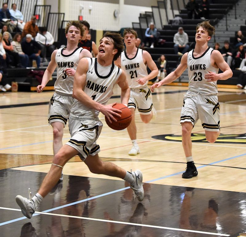 Corning's Kohl Hogue goes up for a layup during a 105-71 win over Wellsville in boys basketball Feb. 10, 2026 at Corning-Painted Post High School as the Hawks closed the regular season with an 18-0 record.