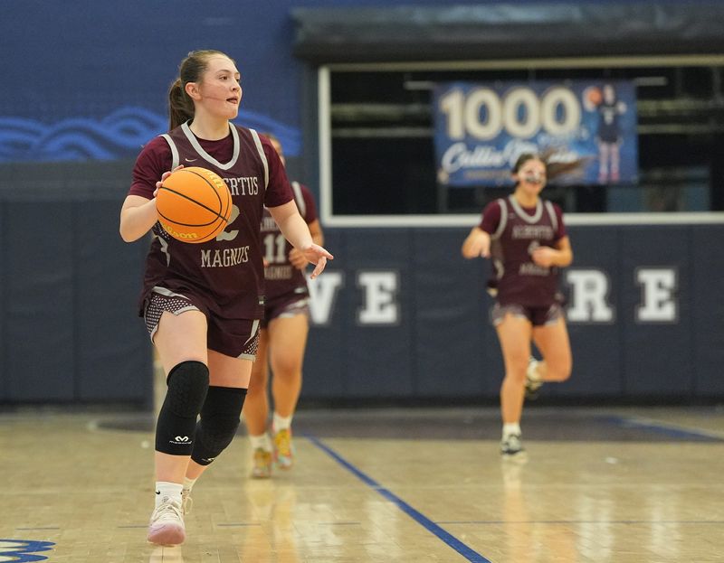 Albertus' Maddy Zuppe (2) looks for a play during girls basketball against Xaverian at Xaverian High School in Brooklyn on Wednesday, February 11, 2026. Albertus won 67-50.