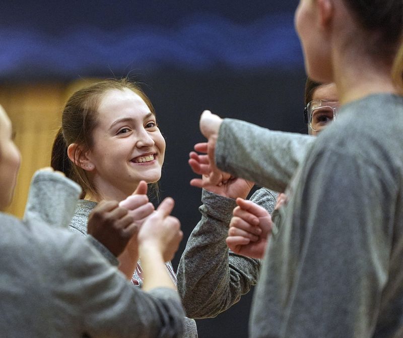 Albertus' Maddy Zuppe gives a smile to teammate Julia Scott (22) prior to their game against Xaverian at Xaverian High School in Brooklyn on Wednesday, February 11, 2026.