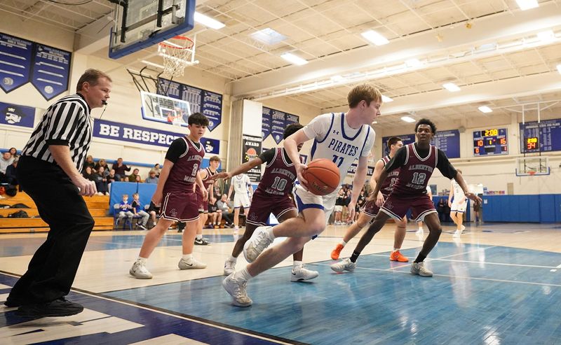 Pearl River's Sean Donohoe (11) picks up a rebound during boys basketball against Albertus Magnus at Pearl River High School in Pearl River on Thursday, February 12, 2026. Pearl River won 65-47.