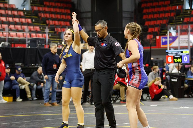 Eventual 138-pound class champion Amelia Toomey of Tioga Central, left, beat Owego Free Academy's Mikenna Wilbur at the Section 4 girls wrestling championships Feb. 13, 2026 at Visions Veterans Memorial Arena in Binghamton.