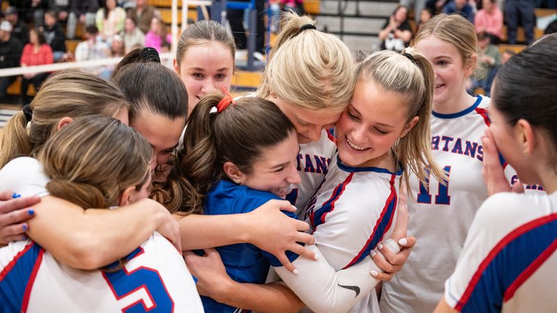 The New Hartford Spartans celebrate after defeating Rome Free Academy 3-0 in the Section III's 2025-26 Class A winter volleyball final at Central Valley Academy.