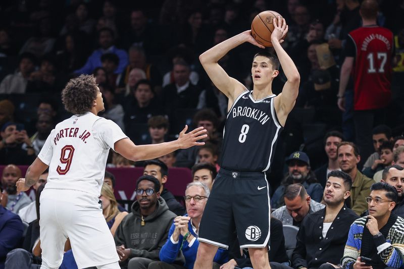 Oct 24, 2025; Brooklyn, New York, USA; Brooklyn Nets guard Egor Demin (8) and Cleveland Cavaliers guard Craig Porter Jr. (9) at Barclays Center. Mandatory Credit: Wendell Cruz-Imagn Images