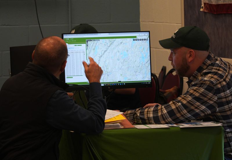 A NYSEG customer service representative speaks with customers at Community Connection event sponsored by NYSEG at Carmel Town Hall in Mahopac in Feb. 17, 2026.