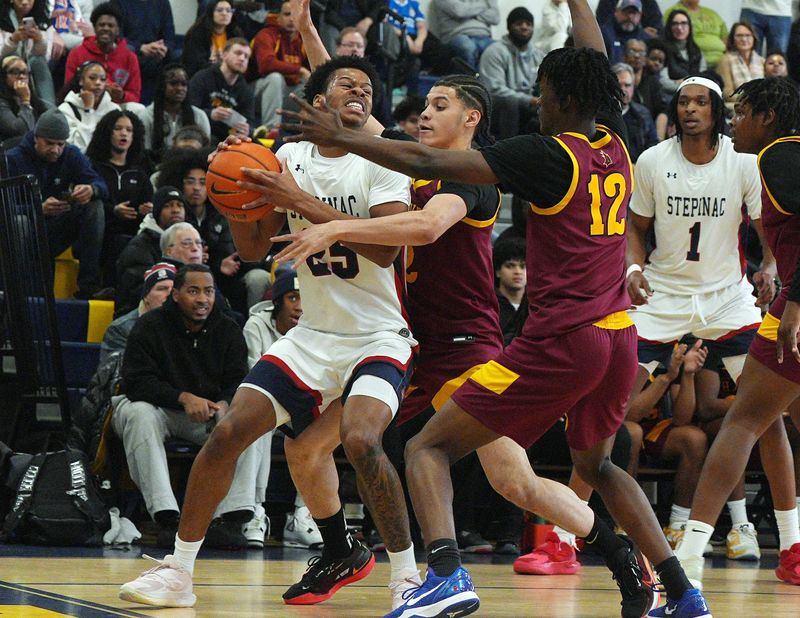 Stepinac’s Jasiah Jervis (25) drives to the basket against Cardinal Hayes during the CHSAA AA Archdiocesan Championship game at Mount Saint Michael Academy in the Bronx Feb. 21, 2026. Stepinac won the game 67-51,