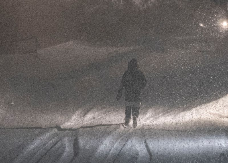 A pedestrian was out before dawn in Tarrytown during blizzard conditions during a nor’easter Feb. 23, 2026.