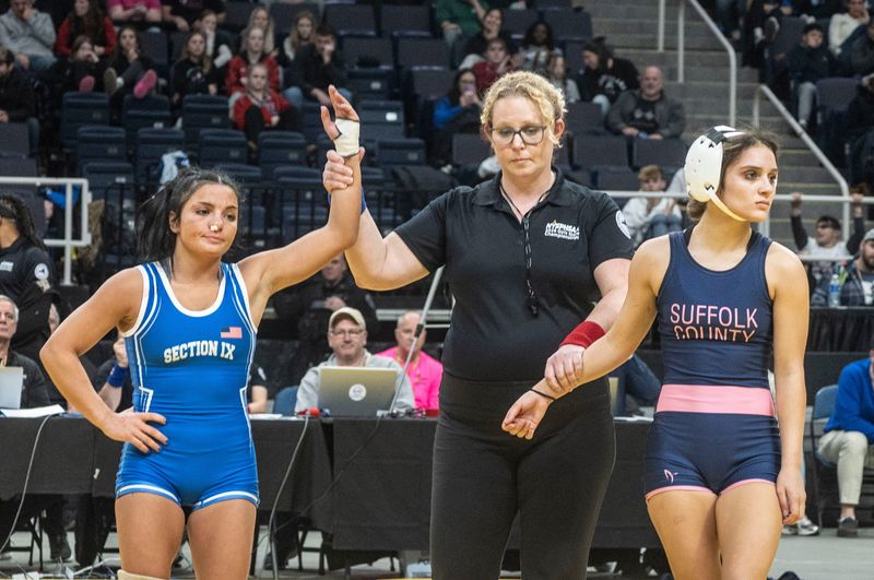 Charlie Wylie of Port Jervis defeated Katie Porcelli of Rocky Point to win the 107 pound championship during the New York State girls freestyle wrestling championships at the MVP Arena in Albany Feb. 26, 2026.