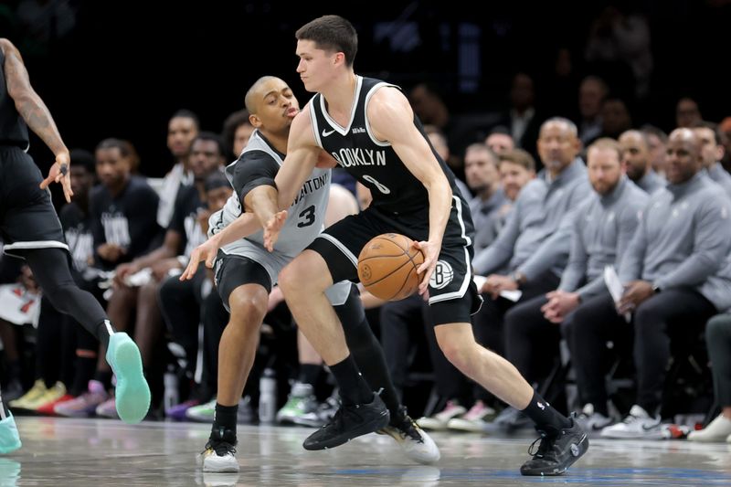 Feb 26, 2026; Brooklyn, New York, USA; Brooklyn Nets guard Egor Demin (8) is fouled by San Antonio Spurs forward Keldon Johnson (3) during the second quarter at Barclays Center. Mandatory Credit: Brad Penner-Imagn Images