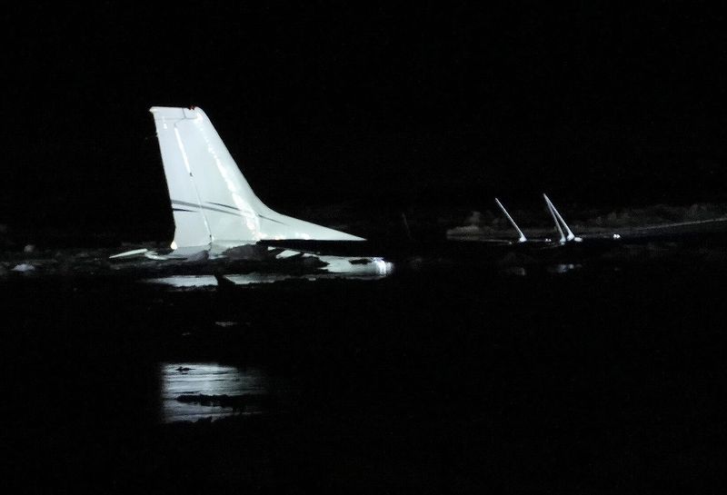 A small plane crashed into the icy Hudson River off Newburgh, New York March 2, 2026. The two occupants of the plane were able to escape injury. Most of the plane sunk into the river with only the tail sticking out of the water.