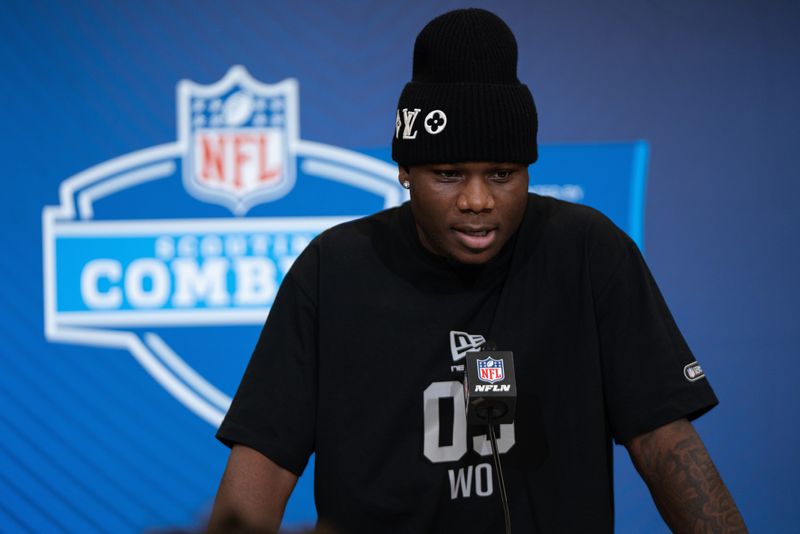 Feb 27, 2026; Indianapolis, IN, USA; Louisville wideout Chris Bell (WO03) speaks to members of the media during the NFL Combine at the Indiana Convention Center. Mandatory Credit: Jacob Musselman-Imagn Images