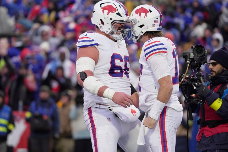 Buffalo Bills guard Connor McGovern and quarterback Josh Allen celebrate in the end zone second half action against the Tampa Bay Buccaneers on Nov 16, 2025 at Highmark Stadium in Orchard Park.