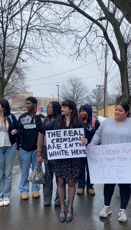 Penfield High School students walked out of class on Friday, March 6 to protest a surge in federal immigration enforcement nationwide. Most students were contained to the school campus, but a small group walked to Five Mile Line Road for more visibility.
