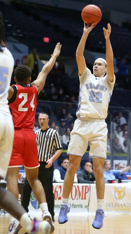 Bishop Kearney/Chesterton Academy’s Maddox Volpe sinks a long jumper over Canisteo-Greenwood’s James Smith III during their Section V Class B2 boys basketball sectionals final Friday, March 6, 2026 at Blue Cross Arena in Rochester.