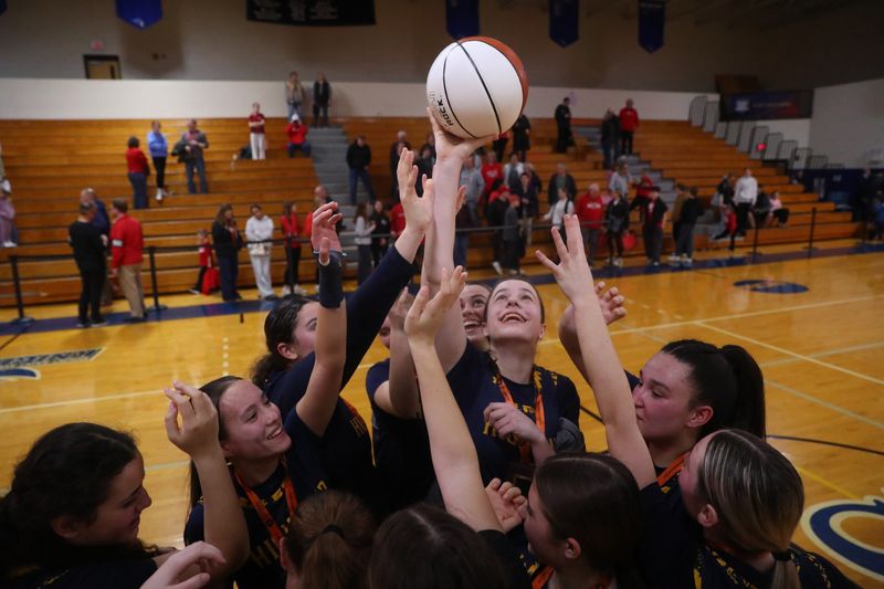 Highland celebrates winning the Section 9 Class girls basketball championship on March 6, 2026.