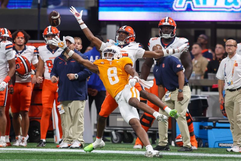 Aug 30, 2025; Atlanta, Georgia, USA; Tennessee Volunteers defensive back Colton Hood (8) breaks up a pass intended for Syracuse Orange wide receiver Darrell Gill Jr. (15) in the fourth quarter at Mercedes-Benz Stadium. Mandatory Credit: Brett Davis-Imagn Images