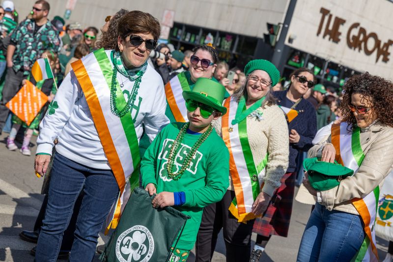 Participants and spectators take part in the 58th annual St. Patrick’s Day Parade from Fayette and Court streets to Edwards Street in Binghamton on March 7.