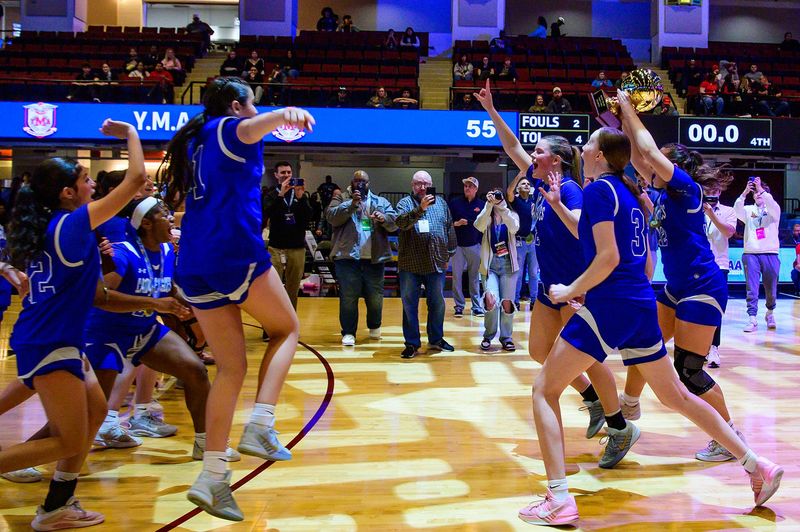 YMA celebrates their win over the Hamilton Raiders during the Section 1 Class B girls basketball championship game at the Westchester County Center in White Plains, NY on Sunday, March 8, 2026.