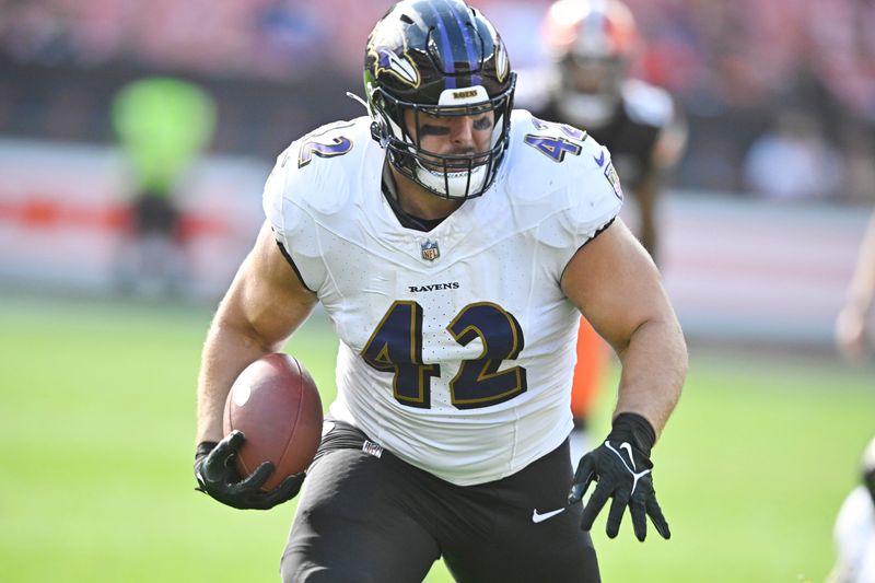 Oct 1, 2023; Cleveland, Ohio, USA; Baltimore Ravens fullback Patrick Ricard (42) runs after a catch in the fourth quarter against the Cleveland Browns at Cleveland Browns Stadium. Mandatory Credit: David Richard-USA TODAY Sports