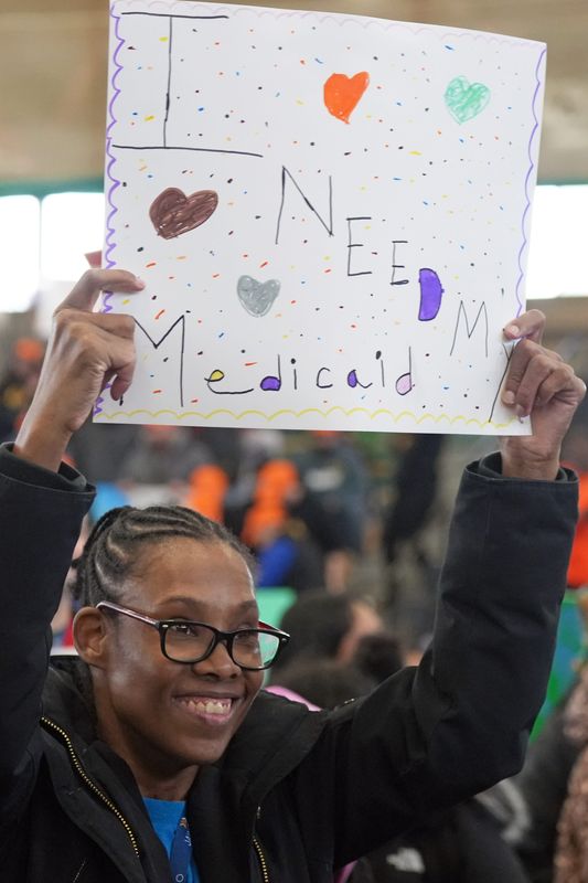 Kareene Bell, 38, of New Rochelle holds a sign that says "I need my Medicaid" during "Rally in the Valley," an advocacy event for people with disabilities that demands more support on the state and federal level March 13, 2026 at SUNY Rockland Community College Fieldhouse in Suffern.