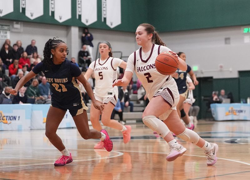 Albertus Magnus' Maddy Zuppe drives on Baldwin's Elizabeth Hill during the Class AAA girls basketball regional final at Yorktown High School in Yorktown Heights on Saturday, March 14, 2026.