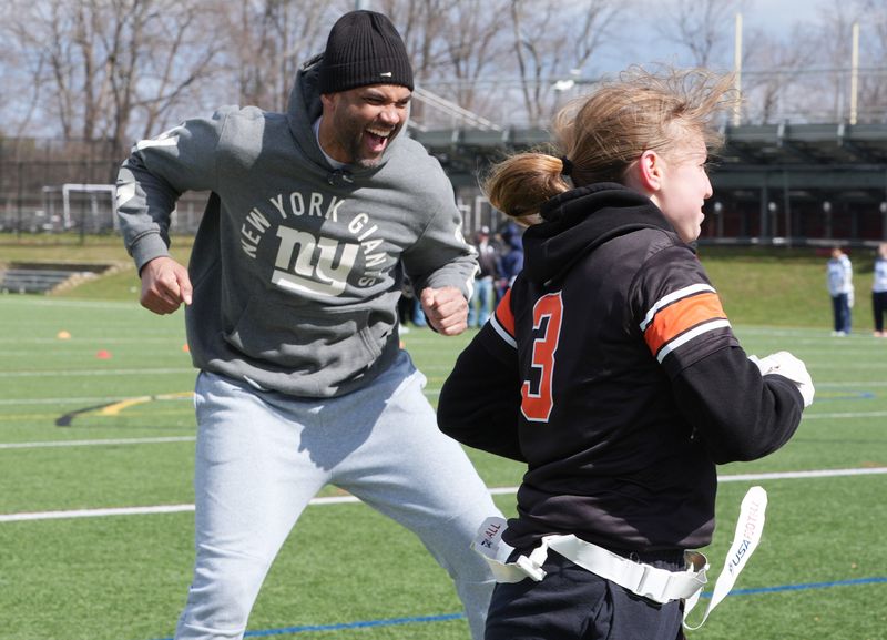 Brandon London was among the former New York Giants players who were on hand to help coach the Section 1 Girls Flag Football Jamboree at Somers High School March 14, 2026.