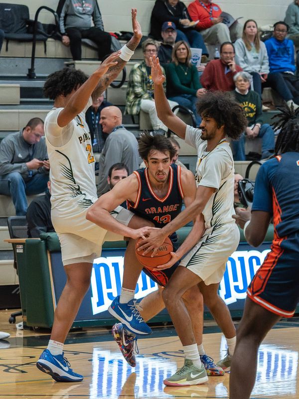 SUNY Orange men's basketball (blue) bowed to Palm Beach State (white) in a second-round game of the NJCAA Div. II tournament in Danville, Ill., on March 17, 2026. NJCAA
