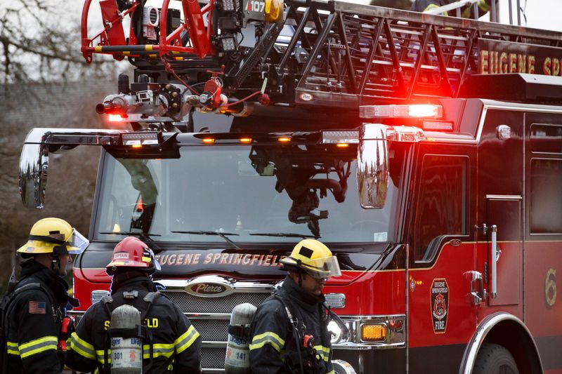 A Eugene Springfield Fire Department crew responds to a house fire on Feb. 27, 2024, in Eugene, Oregon.
