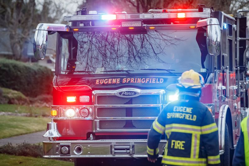 A Eugene Springfield Fire Department crew responds to a house fire on Feb. 27, 2024, in Eugene, Oregon.