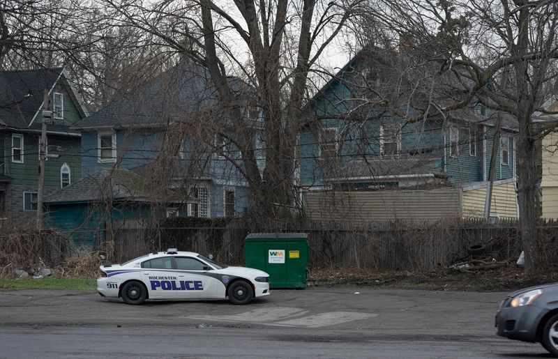 A Rochester police officer was shot after stepping out of his vehicle to talk to a man walking on Lake Avenue south of Driving Park Avenue and was injured in the lower body on March 20, 2026. The officer was taken to Rochester General Hospital with injuries not considered life threatening. Police found a male who had been hiding in brush in the 700 block of Lake Avenue who they believe was the man who shot at the officer. The male shot and killed himself after a police drone shined a light on him. Police are continuing the investigation in the area, an officer's vehicle is seen parked in the far corner of the Dunkin Donut's parking lot on Lake Avenue.