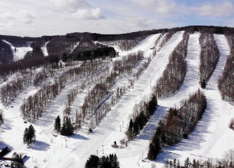 Greek Peak Mountain Resort was founded in 1958 and has 45 ski trails and 11 glades, six chair lifts, two surface lifts, a tubing conveyor lift, a beginners’ slope, and new and improved terrain parks.