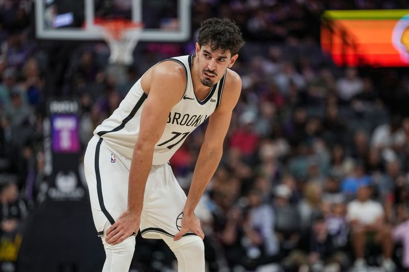 Mar 22, 2026; Sacramento, California, USA; Brooklyn Nets guard Ben Saraf (77) looks on during the fourth quarter against the Sacramento Kings at Golden 1 Center. Mandatory Credit: Justine Willard-Imagn Images