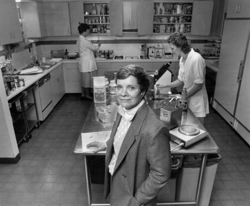 Mary Ellen Burris, the consumer affairs director of Wegmans Food Markets, is in their test kitchen Jan. 2, 1988, with quality control experts Janice Pryll, rear left, and Jeanne White rear right.