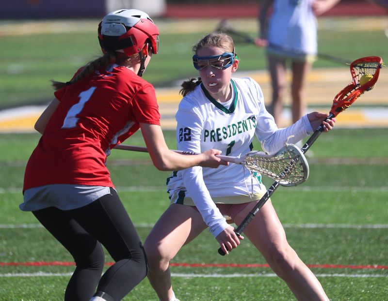 FDR’s Ella Sardino squares up against Red Hook’s Caroline Pethic during Tuesday’s girls lacrosse game in Hyde Park on March 24, 2026.