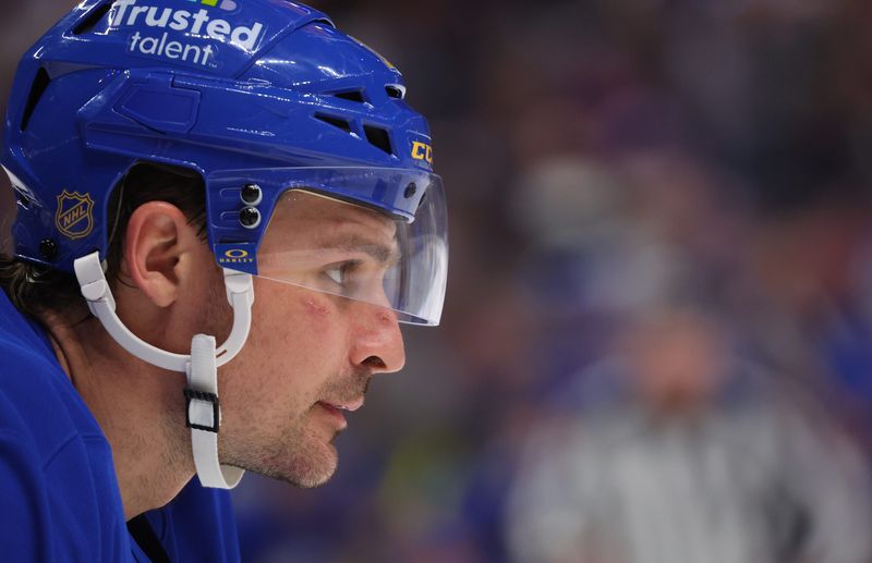 Buffalo Sabres center Sam Carrick (10) waits for the face-off during the third period against the Boston Bruins at KeyBank Center on Wednesday, March 25.