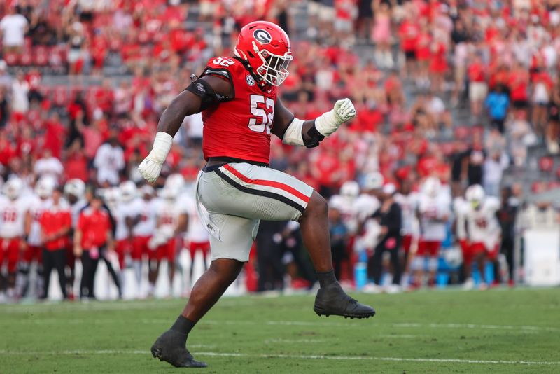 Sep 6, 2025; Athens, Georgia, USA; Georgia Bulldogs defensive lineman Christen Miller (52) reacts after a defensive stop against the Austin Peay Governors in the fourth quarter at Sanford Stadium. Mandatory Credit: Brett Davis-Imagn Images