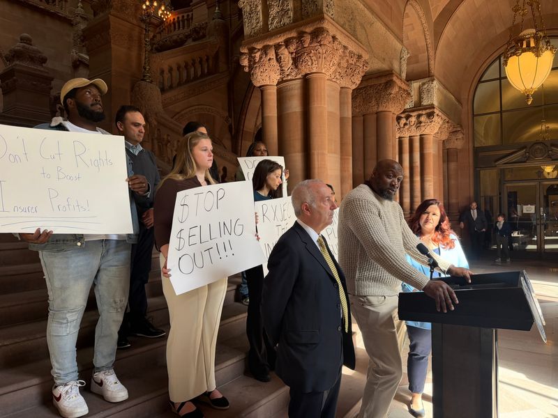 New York State Trial Lawyers Association president Andrew Finkelstein, Assemblymember Jen Lunsford, D-Rochester, and several car crash victims spoke out against some of Gov. Kathy Hochul's car insurance proposals at the New York State Capitol on Monday, March 30, 2026.