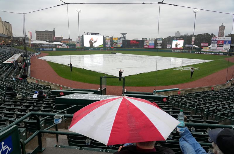 Red Wings General Manager Dan Mason announces that the Wings home opener will start in a rain delay during the Red Wings home opener Tuesday, March 31, 2026 at ESL Ballpark in Rochester. The rain never stopped, forcing the postponement of opening day until tomorrow, April 1.