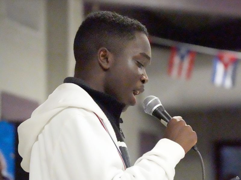 Will Coichy sings a Haitian song at the Nyack High School multicultural festival March 5, 2026.