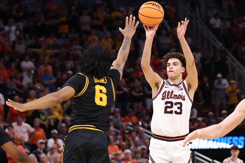 Mar 28, 2026; Houston, TX, USA; Illinois Fighting Illini guard Keaton Wagler (23) shoots against Iowa Hawkeyes guard Tavion Banks (6) in the first half during an Elite Eight game of the South Regional of the men's 2026 NCAA Tournament at Toyota Center. Mandatory Credit: Troy Taormina-Imagn Images