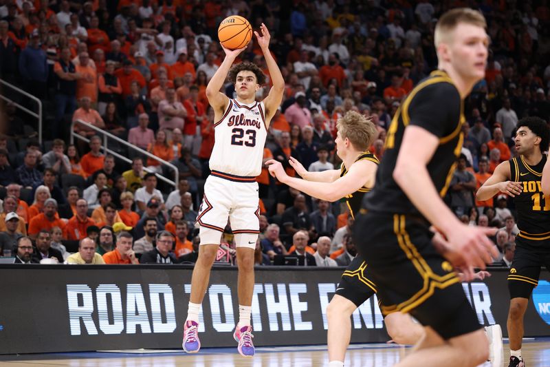 Mar 28, 2026; Houston, TX, USA; Illinois Fighting Illini guard Keaton Wagler (23) shoots against the Iowa Hawkeyes in the first half during an Elite Eight game of the South Regional of the men's 2026 NCAA Tournament at Toyota Center. Mandatory Credit: Troy Taormina-Imagn Images