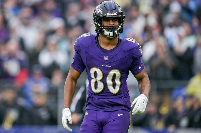 Dec 10, 2023; Baltimore, Maryland, USA; Baltimore Ravens tight end Isaiah Likely (80) celebrates his touchdown against the Los Angeles Rams during the first quarter at M&T Bank Stadium. Mandatory Credit: Jessica Rapfogel-USA TODAY Sports
