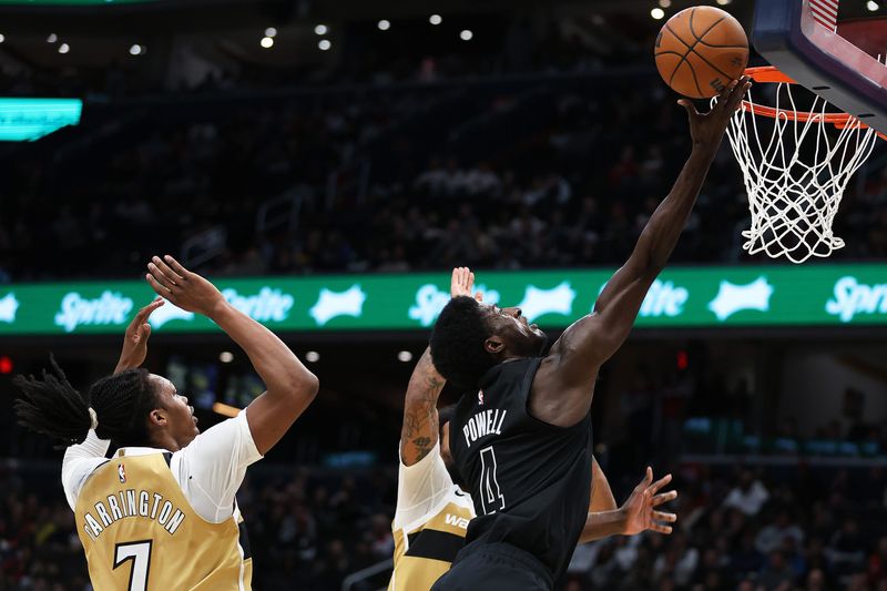 Jan 2, 2026; Washington, District of Columbia, USA; Brooklyn Nets guard Drake Powell (4) takes a shot over Washington Wizards guard Bub Carrington (7) during the first half at Capital One Arena. Mandatory Credit: Daniel Kucin Jr.-Imagn Images