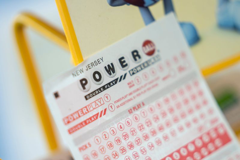 A ticket for New Jersey Lottery Powerball at Food Mart Liquor and Convenience Store on Market St. on Monday, April 6, 2026, in Elmwood Park.