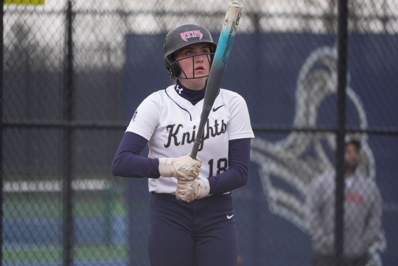 Pittsford Sutherland’s Emma Hollenbeck reacts as she moves away from the home plate between pitches at Pittsford Sutherland High School in Pittsford on April 6, 2026.