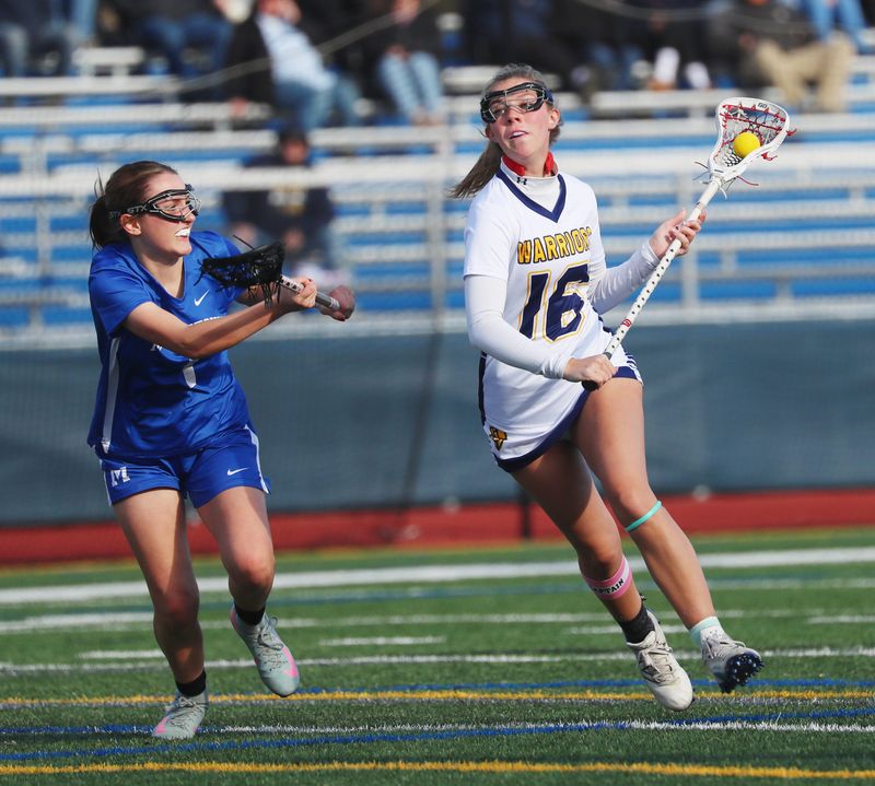 Lourdes’ Taryn Satkowski leads Middletown’s Jaidalyn Jones during Monday’s girls lacrosse game on April 6, 2026.
